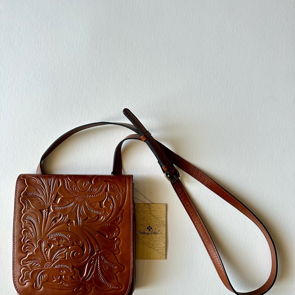 NWT Patrica Nash Brown Embossed Crossbody Bag with Dust Cover.  100% Leather